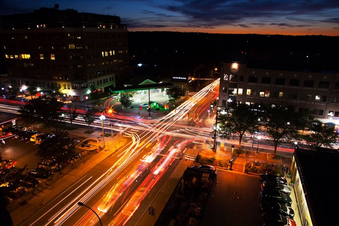 A long exposure photograph of an Ann Arbor intersection at twilight