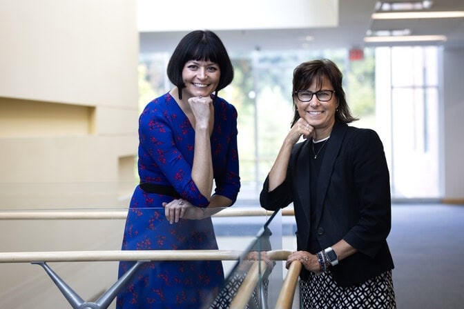 Erin Cech and Cindy Finelli pose together for a photo on North Campus